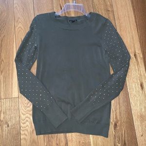 Olive green sweater with gold studs on sleeves